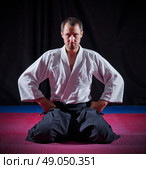 Aikido fighter on black background. Стоковое фото, агентство Ingram Publishing / Фотобанк Лори