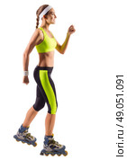 Sporty young girl on roller skates isolated. Стоковое фото, агентство Ingram Publishing / Фотобанк Лори