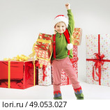 Cute little elf with big gift. Стоковое фото, агентство Ingram Publishing / Фотобанк Лори