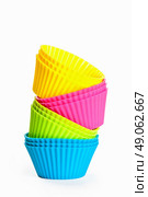 baking silicone cups for cupcakes or muffins on white background. Стоковое фото, агентство Ingram Publishing / Фотобанк Лори