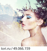 Portrait of beautiful sensual woman with elegant hairstyle.  Fashion photo. Double exposure portrait of woman combined with photograph of nature. Стоковое фото, агентство Ingram Publishing / Фотобанк Лори
