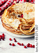 Freshly baked pancakes on a light background for the holiday carnival. Pancakes in a rustic style. Стоковое фото, агентство Ingram Publishing / Фотобанк Лори