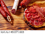 Tapas Iberico ham and lomo sausage from Spain. Стоковое фото, агентство Ingram Publishing / Фотобанк Лори