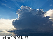 cloudscape with sunbeams before thunderstorm. Стоковое фото, агентство Ingram Publishing / Фотобанк Лори