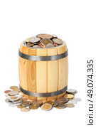 overflowing barrel with various coins. Стоковое фото, агентство Ingram Publishing / Фотобанк Лори