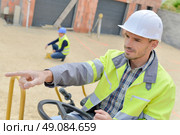 Man driving a digger. Стоковое фото, агентство Ingram Publishing / Фотобанк Лори