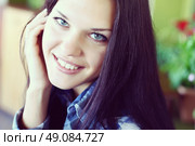 portrait of a young brunette woman with long beautiful hair close-up. Стоковое фото, агентство Ingram Publishing / Фотобанк Лори