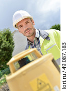 Cheerful site surveyor. Стоковое фото, агентство Ingram Publishing / Фотобанк Лори
