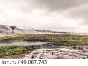 Geothermal activity in a landscape from Iceland in cloudy weather. Стоковое фото, агентство Ingram Publishing / Фотобанк Лори