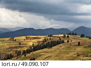 Spring rain in mountains. Thunder and clouds. Стоковое фото, агентство Ingram Publishing / Фотобанк Лори
