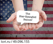 The Star-Spangled Banner written on a speechbubble. Стоковое фото, агентство Ingram Publishing / Фотобанк Лори