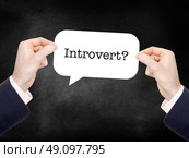 Introvert? written on a speechbubble. Стоковое фото, агентство Ingram Publishing / Фотобанк Лори