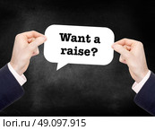 Want a raise? written on a speechbubble. Стоковое фото, агентство Ingram Publishing / Фотобанк Лори