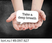 Deep breath written on a speechbubble. Стоковое фото, агентство Ingram Publishing / Фотобанк Лори