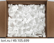 white styrofoam pellets in cardboard box. Стоковое фото, агентство Ingram Publishing / Фотобанк Лори