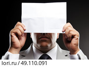 Mysterious Identity: Man in a sharp suit mysteriously conceals his identity by holding plain white piece of paper over his face, creating aura of intrigue and anonymity. Стоковое AI-изображение, AI-художник Данила Большаков / Фотобанк Лори