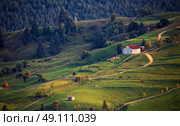 September rural scene in Carpathian mountains. Authentic village and fence. Стоковое фото, агентство Ingram Publishing / Фотобанк Лори