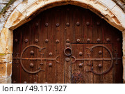 Zamora detail of old aged wood door in Spain by the via de la Plata way. Стоковое фото, агентство Ingram Publishing / Фотобанк Лори