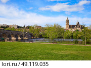 Salamanca skyline and roman bridge over Tormes river in Spain. Стоковое фото, агентство Ingram Publishing / Фотобанк Лори