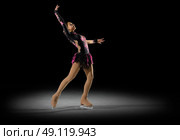 Young girl figure skater (half-isolated version) Стоковое фото, агентство Ingram Publishing / Фотобанк Лори