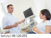 ongoing to have an ultrasound. Стоковое фото, агентство Ingram Publishing / Фотобанк Лори