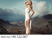 Sensual blond lady taking the sunbath. Стоковое фото, агентство Ingram Publishing / Фотобанк Лори