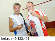 men playing pala. Стоковое фото, агентство Ingram Publishing / Фотобанк Лори