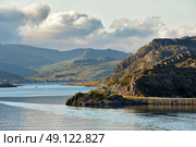 Norway road on coastline of a fjord. Nordic sunny summer day. Lofoten Norway islands. Стоковое фото, агентство Ingram Publishing / Фотобанк Лори