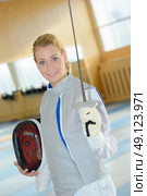 girl doing fencing. Стоковое фото, агентство Ingram Publishing / Фотобанк Лори