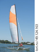sailing on a lake - summer and sports theme. Стоковое фото, агентство Ingram Publishing / Фотобанк Лори
