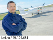 Portrait of man at aerodrome. Стоковое фото, агентство Ingram Publishing / Фотобанк Лори