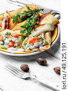 Pancakes for Shrove Tuesday. Tasty pancakes stuffed with meat and mushrooms on the plate. Стоковое фото, агентство Ingram Publishing / Фотобанк Лори