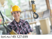 female worker at a construction site. Стоковое фото, агентство Ingram Publishing / Фотобанк Лори