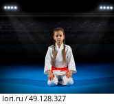 Girl martial arts  fighter at sports hall. Стоковое фото, агентство Ingram Publishing / Фотобанк Лори