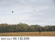 Group Of Men On A Driven Game Shoot. Стоковое фото, агентство Ingram Publishing / Фотобанк Лори