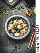 Bowl of Japanese miso soup , top view. Стоковое фото, агентство Ingram Publishing / Фотобанк Лори