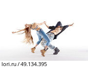 Two talented breakdancers practising together. Стоковое фото, агентство Ingram Publishing / Фотобанк Лори