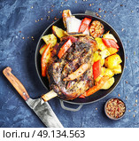 Roast mutton in the pan. Mutton cooked in a pan with potatoes and vegetables. Стоковое фото, агентство Ingram Publishing / Фотобанк Лори