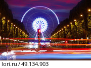 Champs Elysees in Paris and Concorde sunset at France. Стоковое фото, агентство Ingram Publishing / Фотобанк Лори