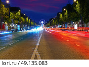Champs Elysees avenue in Paris at France. Стоковое фото, агентство Ingram Publishing / Фотобанк Лори