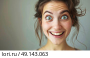 A woman with a startled expression on her face, showing surprise or shock. Стоковое AI-изображение, AI-художник Данила Большаков / Фотобанк Лори
