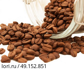 Heap of coffee beans from jar . Стоковое фото, агентство Ingram Publishing / Фотобанк Лори