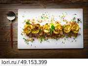 Artichoke roses with truffle and honey vinaigrette. Стоковое фото, агентство Ingram Publishing / Фотобанк Лори