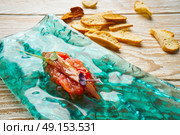 Anchovies on fresh grated tomato starter tapas. Стоковое фото, агентство Ingram Publishing / Фотобанк Лори