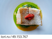 Atlantic hake over dried tomato ratatouille recipe. Стоковое фото, агентство Ingram Publishing / Фотобанк Лори