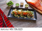 Wakame algae salad with salmon wasabi sesame and sprouts. Стоковое фото, агентство Ingram Publishing / Фотобанк Лори