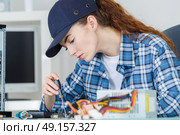 Female computer technician at work. Стоковое фото, агентство Ingram Publishing / Фотобанк Лори