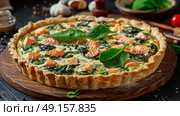 quiche with spinach and salmon and bechamel sauce. Стоковое AI-изображение, AI-художник Anastasy Yarmolovich / Фотобанк Лори
