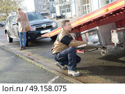 tow truck in the street. Стоковое фото, агентство Ingram Publishing / Фотобанк Лори
