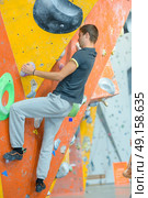 difficulty in rock climbing. Стоковое фото, агентство Ingram Publishing / Фотобанк Лори